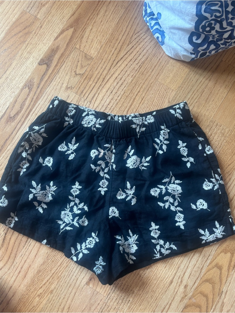 Abercrombie & Fitch Black Shorts with White Floral Embroidery.